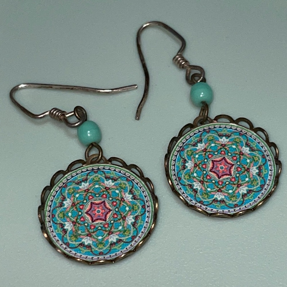 Turquoise, pink, and white mandala pattern earrings